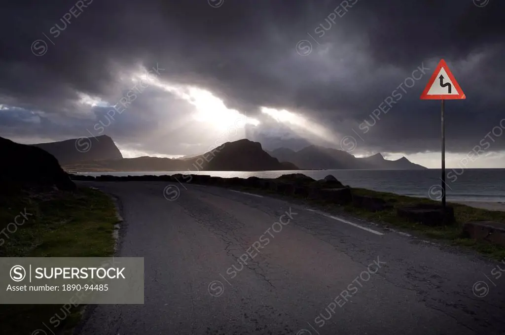 Empty road running alongside fjord, Norway, Scandinavia, Europe
