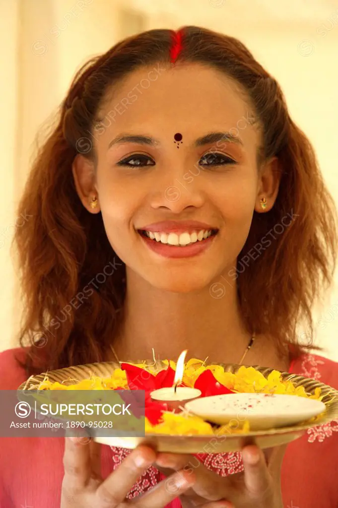 Girl performing Aarti, the Welcome Ceremony, India, Asia