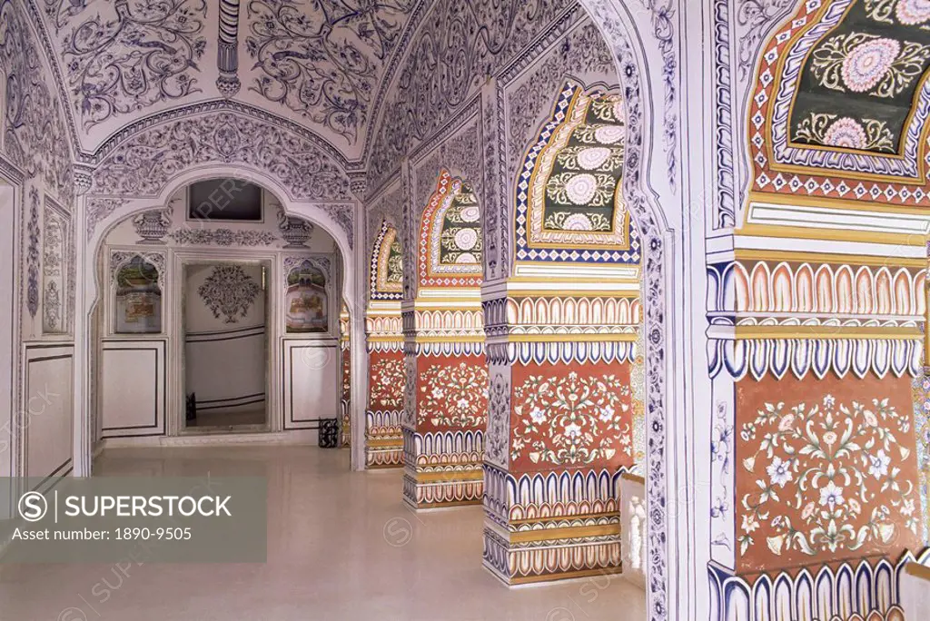 The painted walls of a covered verandah which surrounds one of the fort courtyards, Kuchaman Fort, Kuchaman, Rajasthan state, India, Asia