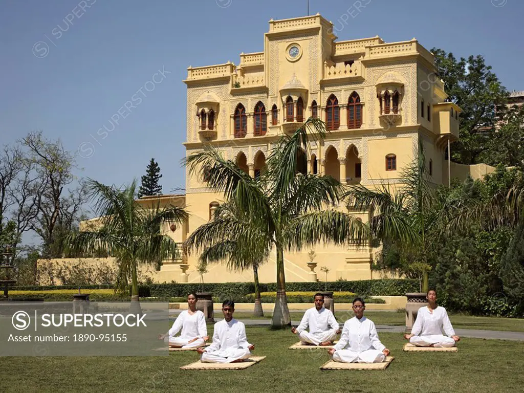 Yoga on the lawn in front of palace at Ananda in the Himalayas, India, Asia