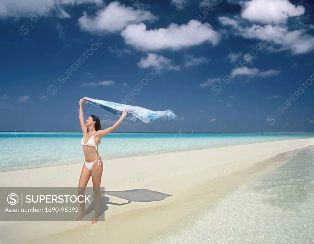 Girl on beach, Rhiveli, Maldives, Indian Ocean, Asia