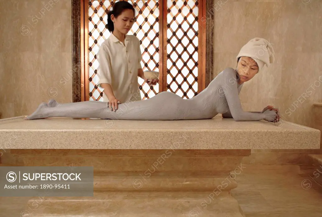 Woman having a mud treatment at the Oriental Spa, Bangkok, Thailand, Southeast Asia, Asia