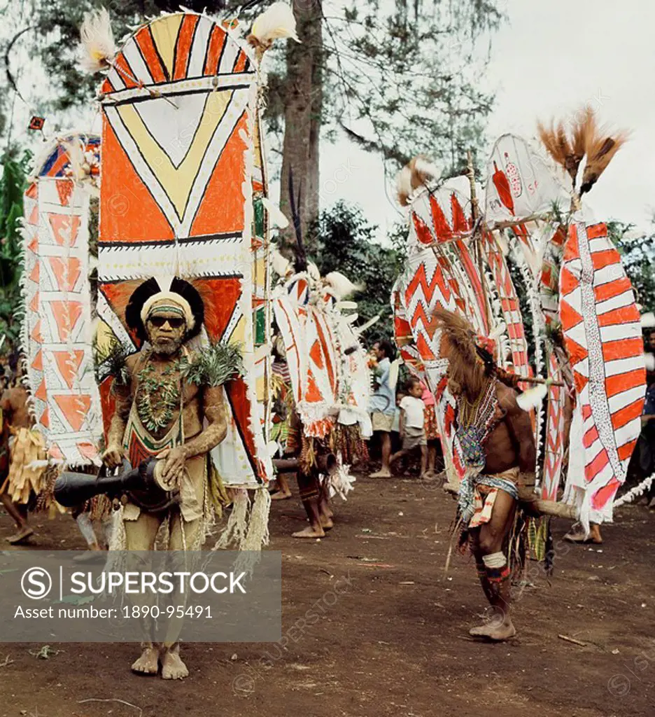 Asaro tribesmen photographed in 1974 in full costume for a rital display of wealth, Goroka, Papua New Guinea, Pacific