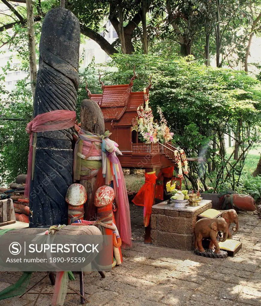 The shrine to Tub Tim, a spirit supposed to enhance fertility for couples and grant a great variety of wishes. Nai Lert Park, Bangkok Thailand, Southe...