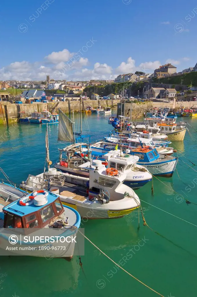 Small fishing boats in the harbour at high tide, Newquay, North Cornwall, England, United Kingdom, Europe