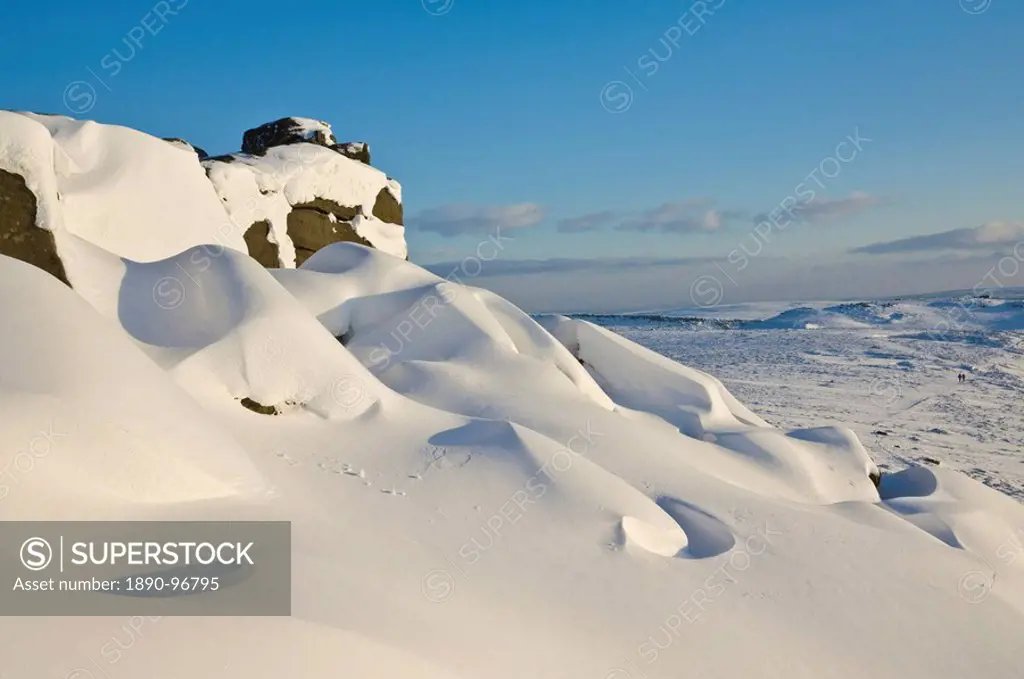 Snow drifts and snow covered moorland at Stanage Edge, Peak District National Park, Derbyshire, England, United Kingdom, Europe