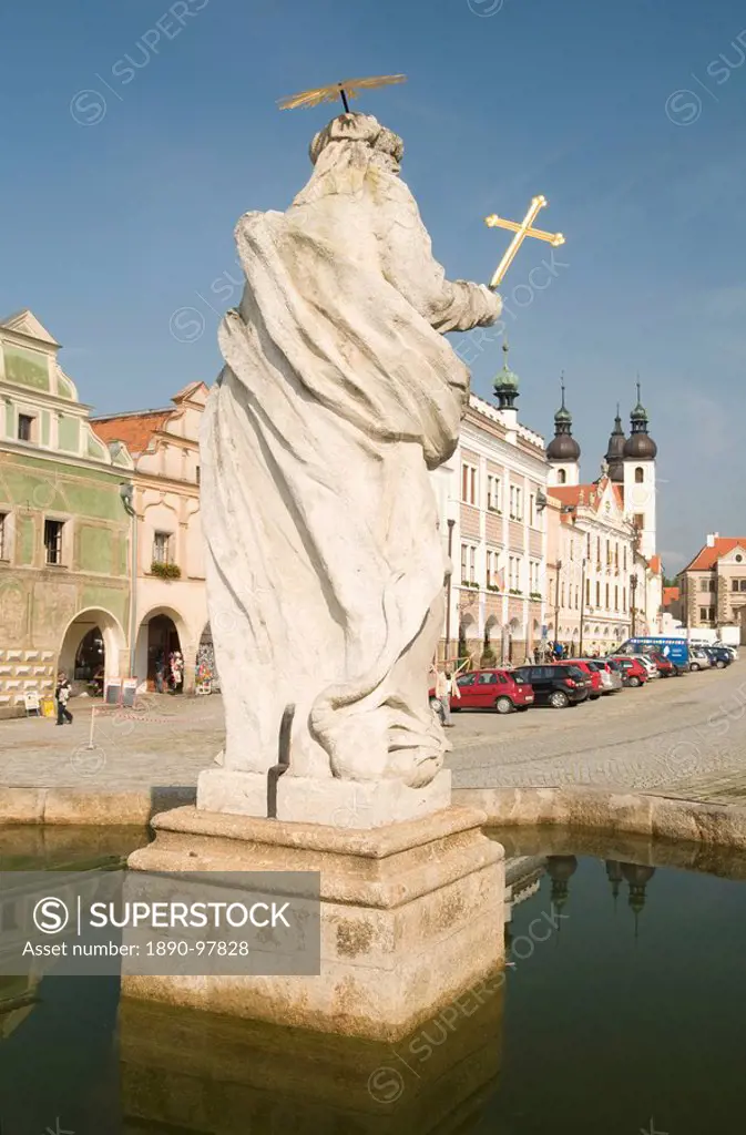 Statue of saint and fountain, Renaissance buildings at Zachariase z Hradce Square, Telc, Jihlava Region, Czech Republic, Europe