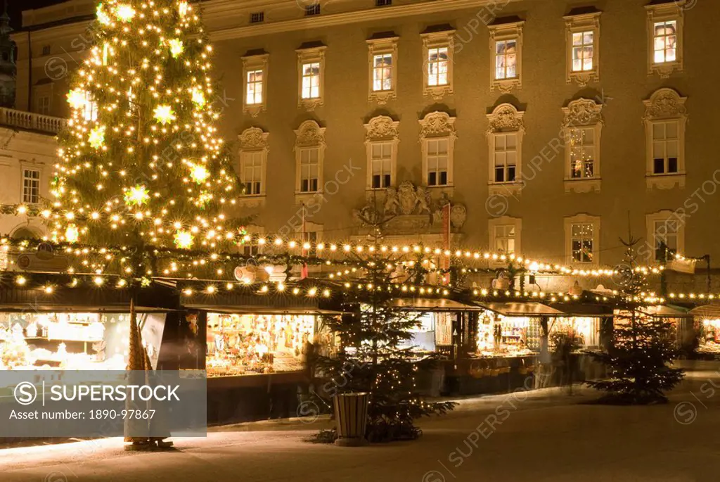 Historical Salzburg Christkindlmarkt Christmas market with stalls and Rezidens building at night, Residenzplatz, Salzburg, Austria, Europe