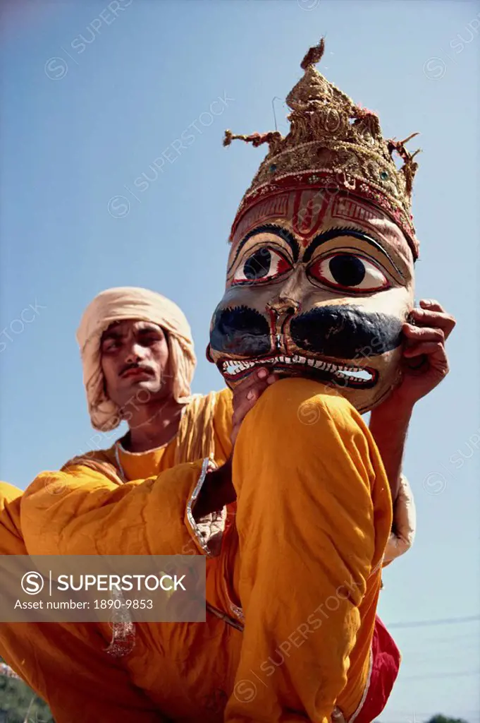 Actor with mask worn in the Ramlilla, the stage play of the Hindu epic the Ramayana, Varanasi, Uttar Pradesh state, India, Asia