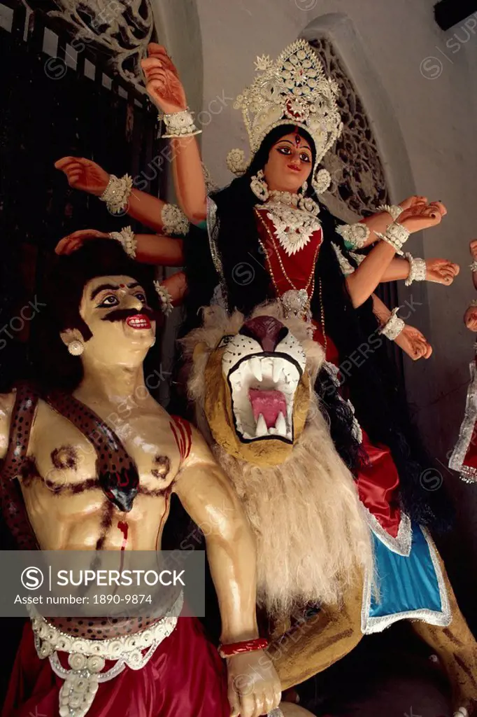 Clay based images including one of Durga, the ten armed warrior goddess, for use in the Durga Puja festival, Varanasi, Uttar Pradesh, India, Asia