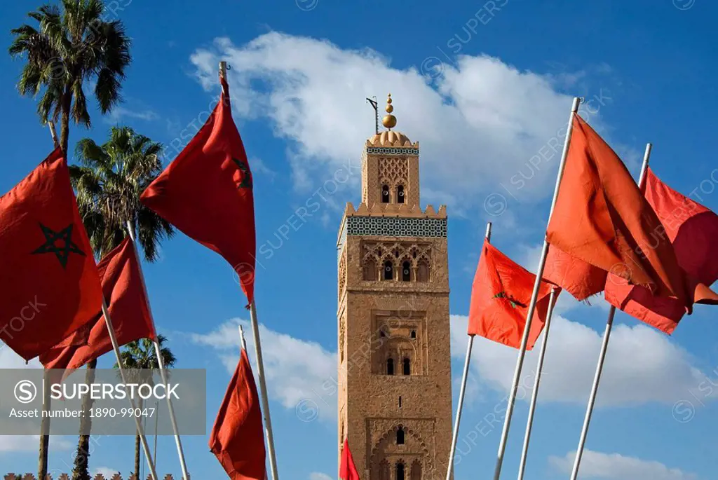 Minaret of the Koutoubia Mosque, UNESCO World Heritage Site, and Moroccan flags, Marrakesh Marrakech, Morocco, North Africa