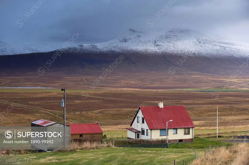 Farm and landscape in Vatsnes Peninsula, with snow_covered mountains in October, north coast of Iceland, Iceland, Polar Regions