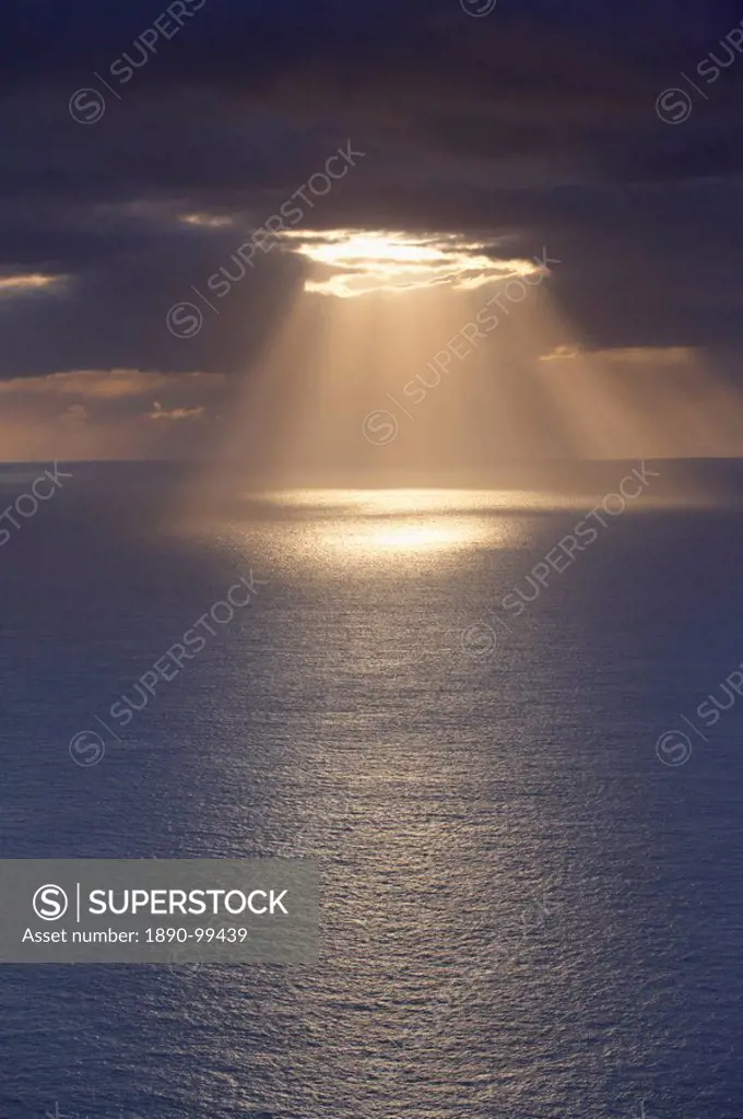 Sunrays over the ocean, west coast of Sandoy, Faroe Islands Faroes, Denmark, Europe