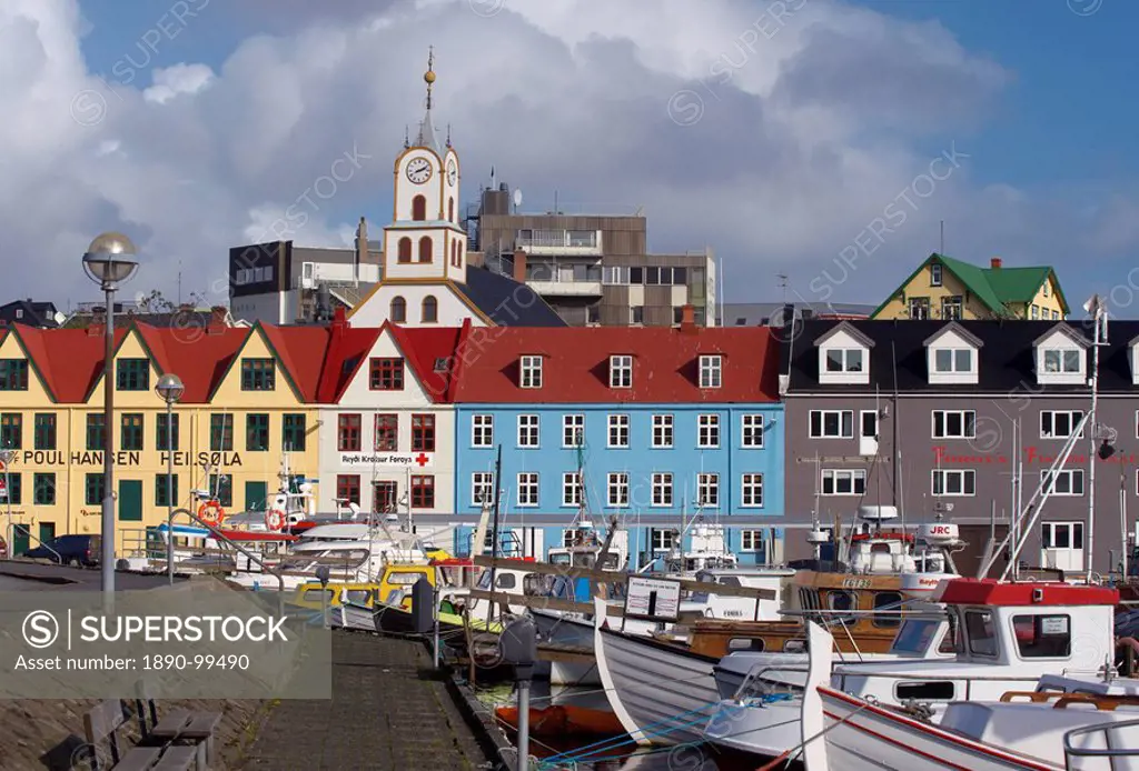 Colourful boats and picturesque gabled buildings along the quayside in Vestaravag harbour, Torshavn, Streymoy, Faroe Islands Faroes, Denmark, Europe