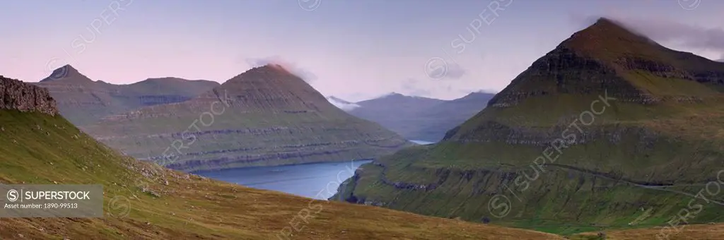 Panoramic view of Eysturoy hills from near Funningur, Husafjall at 895m high on the right, Mulatindur in the distance, Eysturoy, Faroe Islands Faroes,...