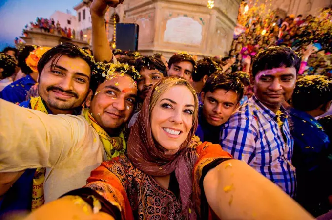 Laura Grier selfie in the crowd during the Flower Holi Festival, Vrindavan, Uttar Pradesh, India, Asia