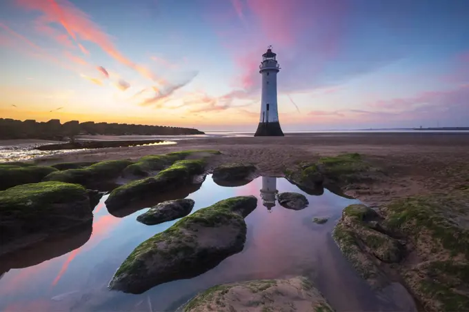 Perch Rock lighthouse with amazing sunset, New Brighton, Cheshire, England, United Kingdom, Europe