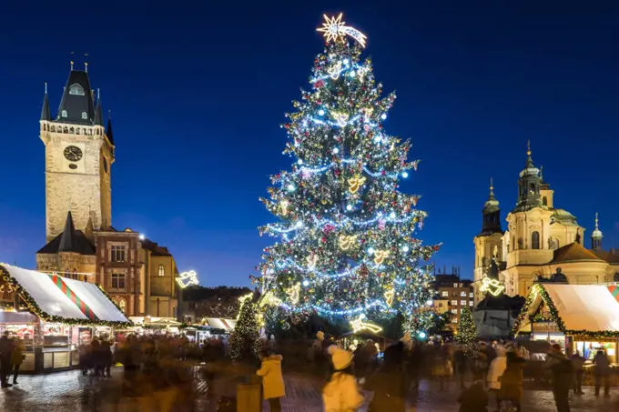 Christmas Market, Christmas tree, Gothic Town Hall and Baroque St. Nicholas Church at Old Town Square, UNESCO World Heritage Site, Old Town, Prague, Czech Republic, Europe