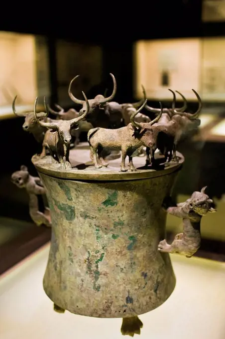 Bronze Han Dynasty cowrie container with yaks and lion decorations, on display in the Shanghai Museum, China