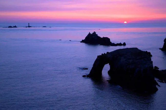 Sunset at Longships Lighthouse, Enys Dodnan and the Armed Knight, Lands End, Cornwall, England, United Kingdom, Europe