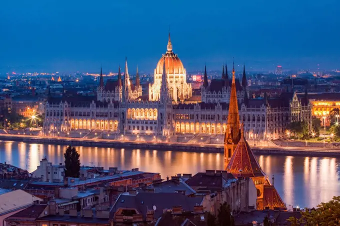 The Hungarian Parliament Building and River Danube at night, UNESCO World Heritage Site, Budapest, Hungary, Europe