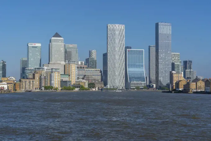 View of Canary Wharf tall buildings from the Thames Path, London, England, United Kingdom, Europe