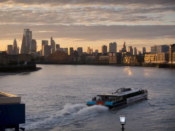 City of London skyline and River Thames from Canary Wharf Clipper, London, England, United Kingdom, Europe