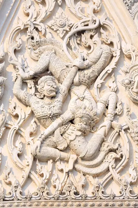 Detail of battling demons on Khmer style Wat Mahathat Worawihan temple in Phetchaburi, Thailand, Southeast Asia, Asia