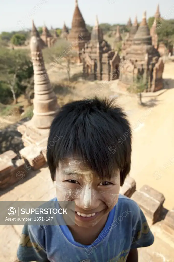 Portrait of a boy at a temple, Bagan Temple, Bagan, Myanmar