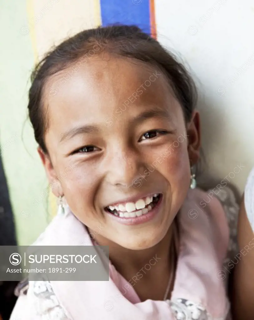 Close-up of a girl smiling, Tibet,