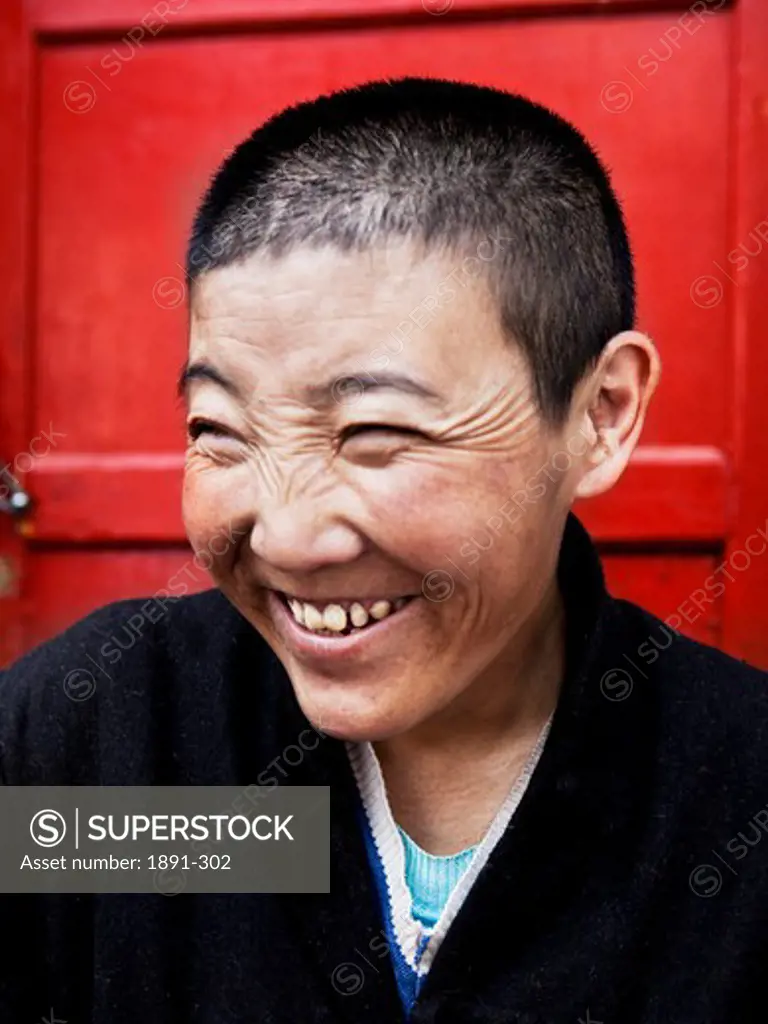 Close-up of a female monk, Tibet,