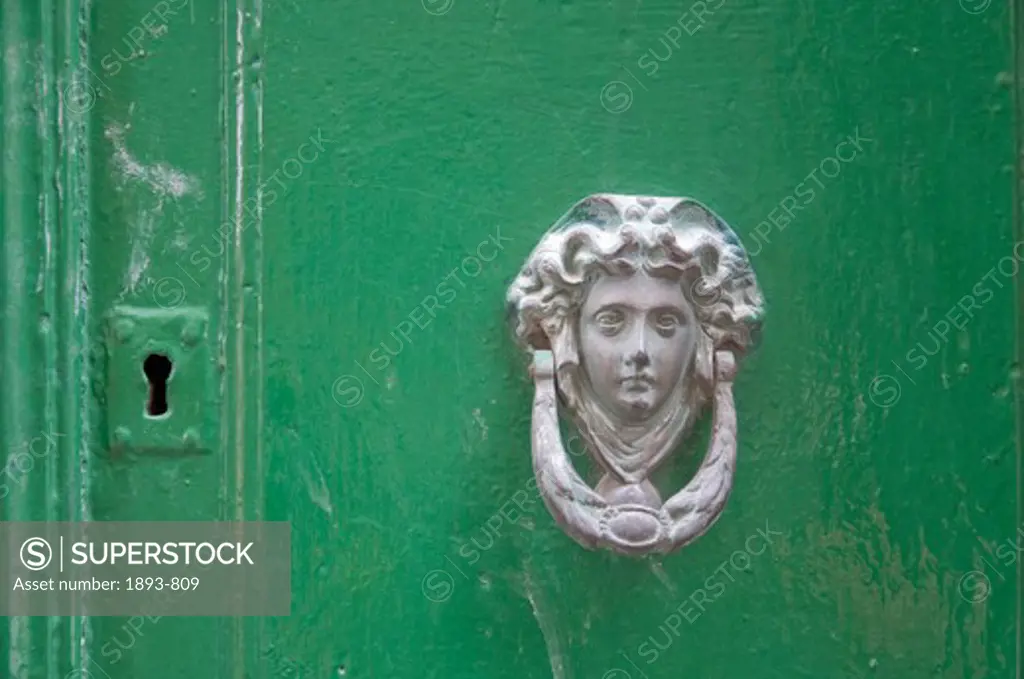 Italy, Anguillara, Close up of bronze door knocker
