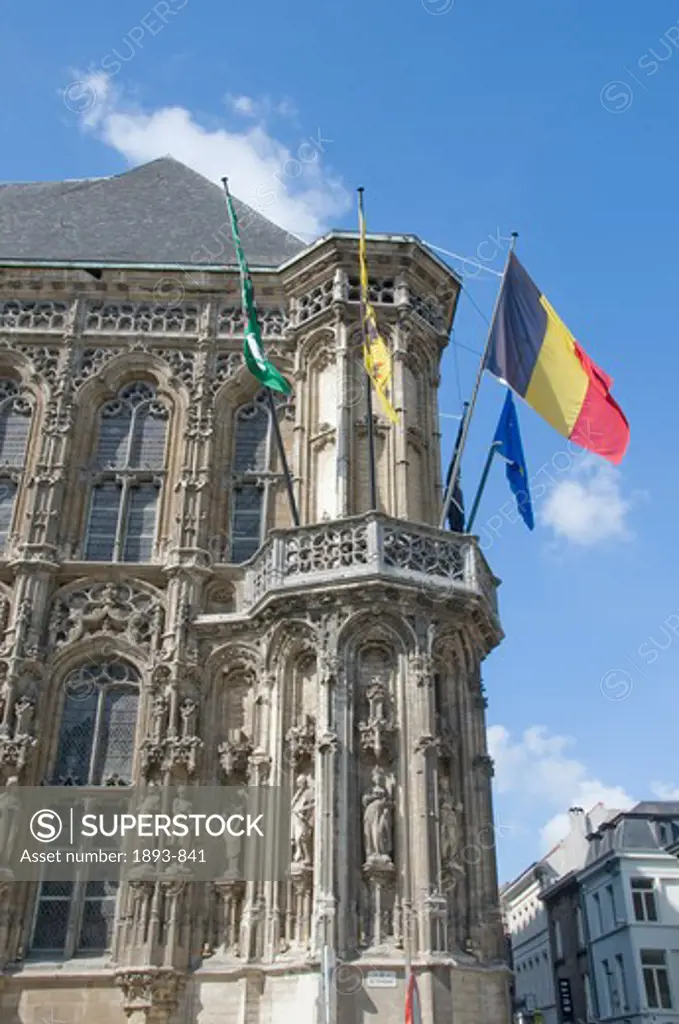 Flags on the corner of the town hall building, Ghent, East Flanders, Flemish Region, Belgium
