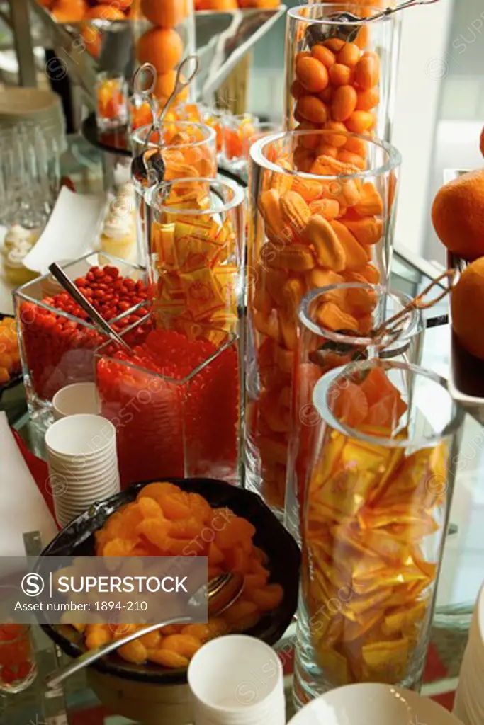 Close-up of sweet treats in presentation glass tubes