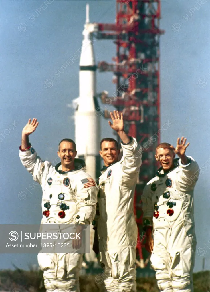 James McDivitt (Commander), David Scott (Command Module pilot) and Russell Schweickart (Lunar Module pilot), are pictured in spacesuits with a Saturn ...