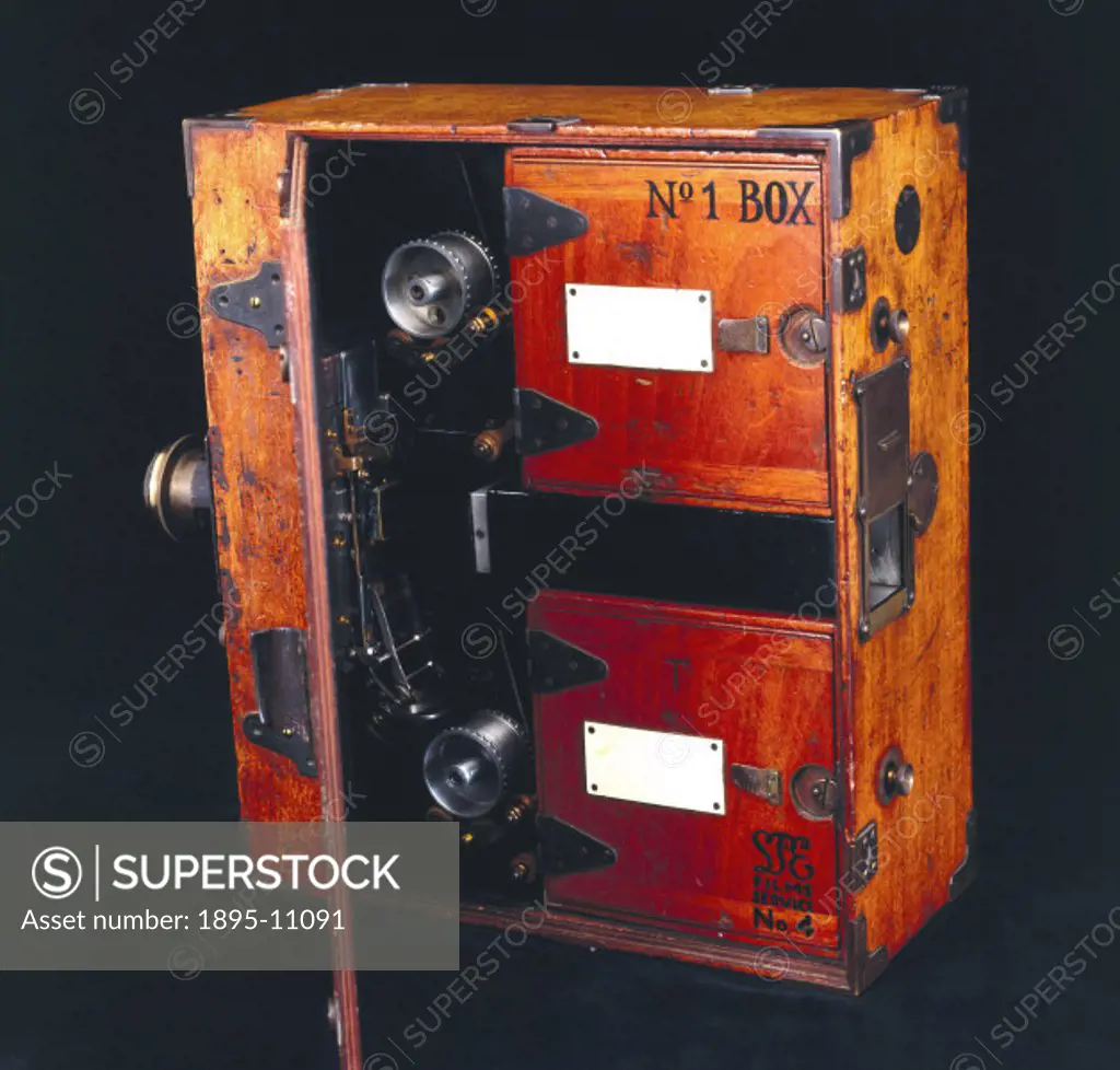 Moy 35mm cine camera, 1909. Made by the London firm of Moy and Bastie, this camera in a wooden case has a Cooke lens and an internal 200 foot film mag...