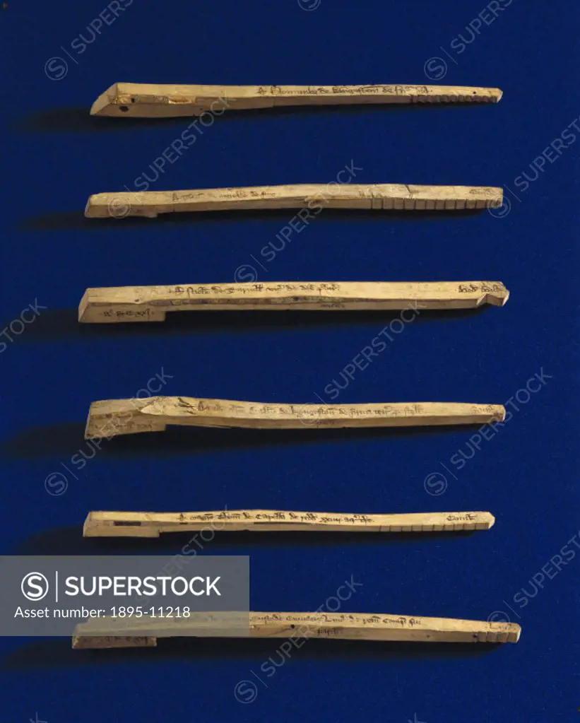 Tally sticks were a method of acounting for loans and payments used by the Treasury. Each stick contains notches to show the amount deposited, the nam...