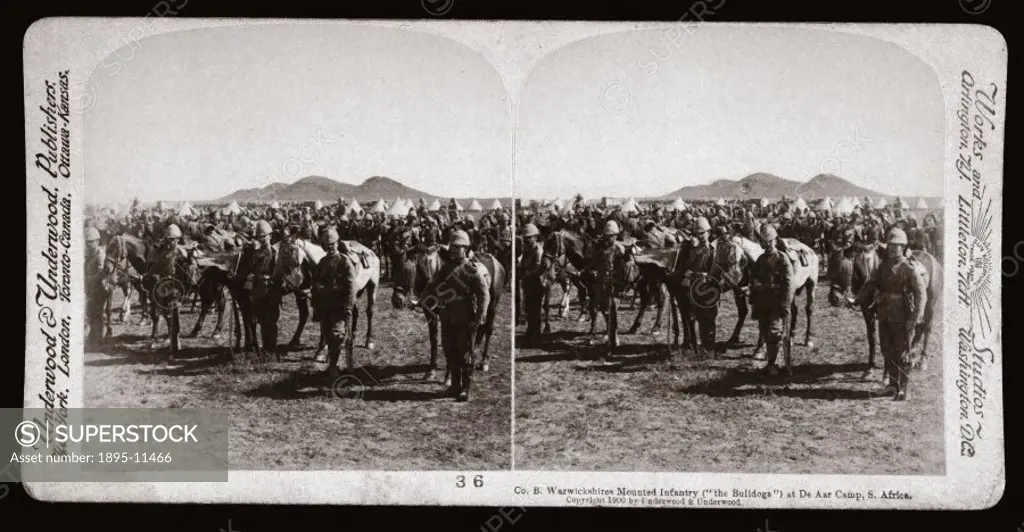 Soldiers of the Warwickshire Mounted Infantry, known as the Bulldogs’, on parade at De Aar Camp in the northern Cape Colony. One of a boxed set of st...