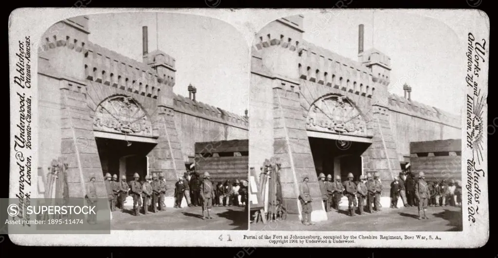 Soldiers of the Cheshire Regiment by the gate of the Johannesburg Fort. One of a boxed set of stereoscope photographs produced for sale to the general...