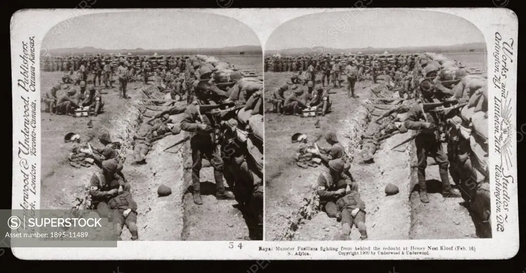 Soldiers behind a sandbagged redoubt. Wounded are being tended, suggesting a recent attack. One of a boxed set of stereoscope photographs produced for...