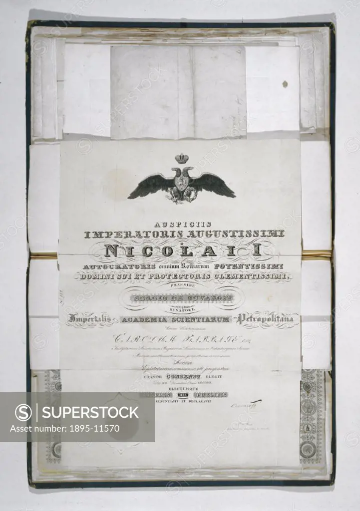 Open folio of diplomas awarded to Charles Babbage (1791-1871). The diploma visible was awarded to Babbage in 1832 by the St Petersburg Imperial Academ...