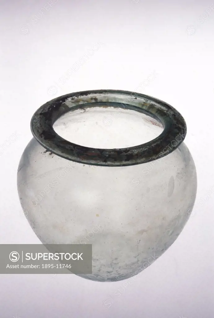 Roman glass urn made in Western Europe. Urns such as these were used to contain the cremated remains of the dead. Angled top view.
