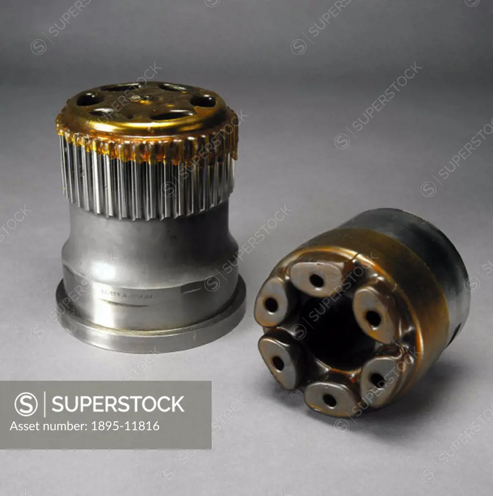 The camshaft pulley needs to be very accurately made and strong as it is used in a motor car. Metal powder is dropped into a die and a punch presses t...