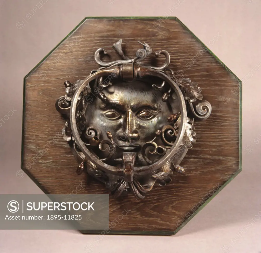 Although steel is very hard, delicate shapes can be made without large industrial machines. Intricate pieces like this door knocker are made by heatin...