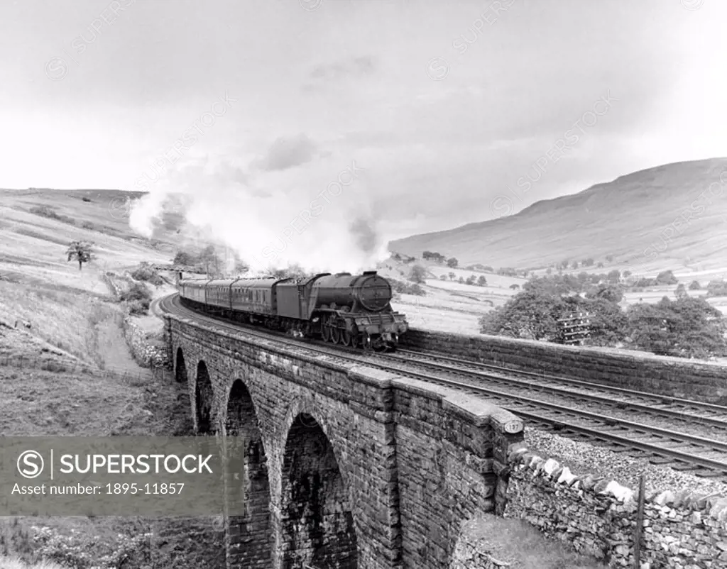 A3 class 4-6-2 steam locomotive No 60082 ´Neil Gow´ hauls a passenger train across Ais Gill Viaduct. In British Railways service. Photographer Eric Tr...