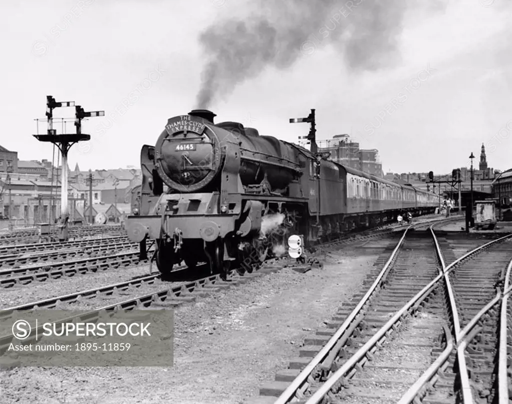 British Railways Royal Scot class 4-6-0 steam locomotive No 46145 ´Duke of Wellington´s Regiment´ leaving Leeds with the Thames-Clyde passenger expres...
