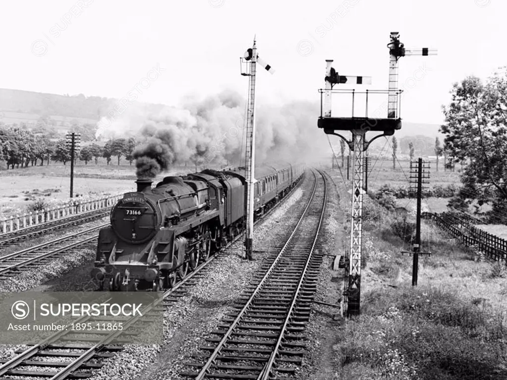 Steam locomotive No 73166 with the northbound ´Waverley Express´ at Marley Junction. The ´Waverley´ passenger service ran between Edinburgh and St Pan...