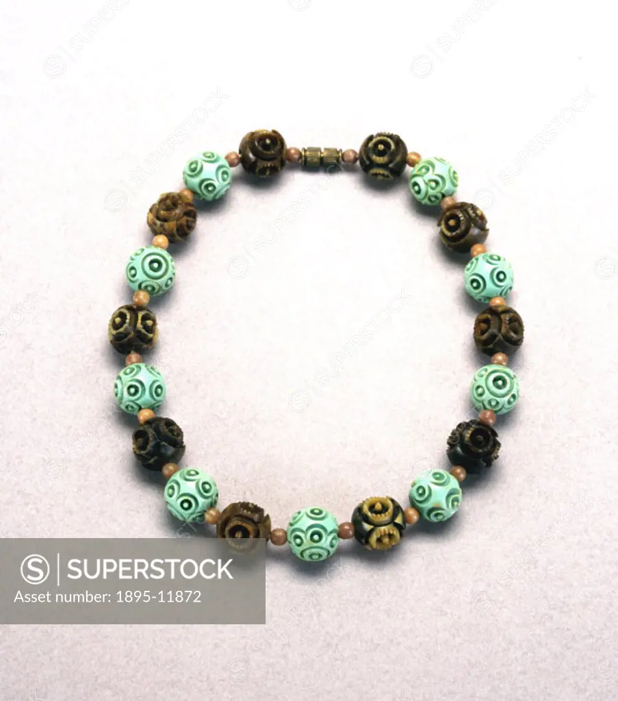 Casein necklace made from imitation jade and tortoiseshell beads moulded in the Chinese style popular in the 1920s and 1930s. These are intersperesed ...