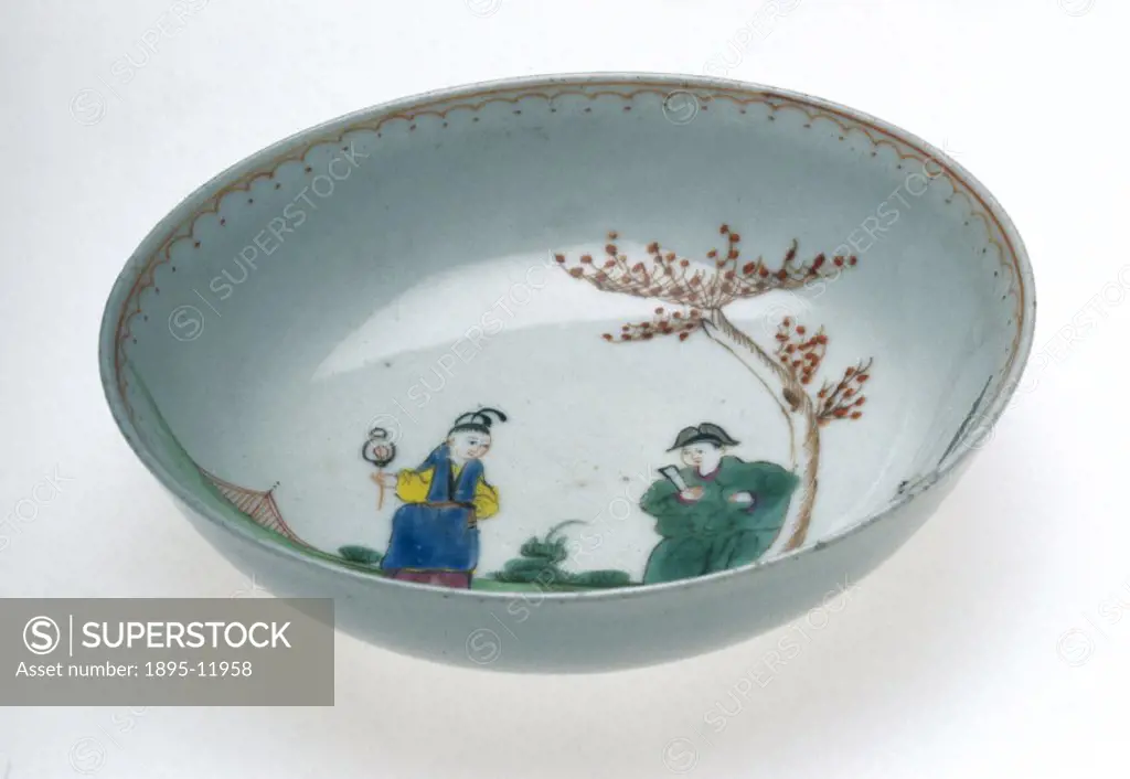 Porcelain saucer, made in a Bristol factory, painted with Chinese figures and landscape. Angled view, partly showing decoration in the bowl.