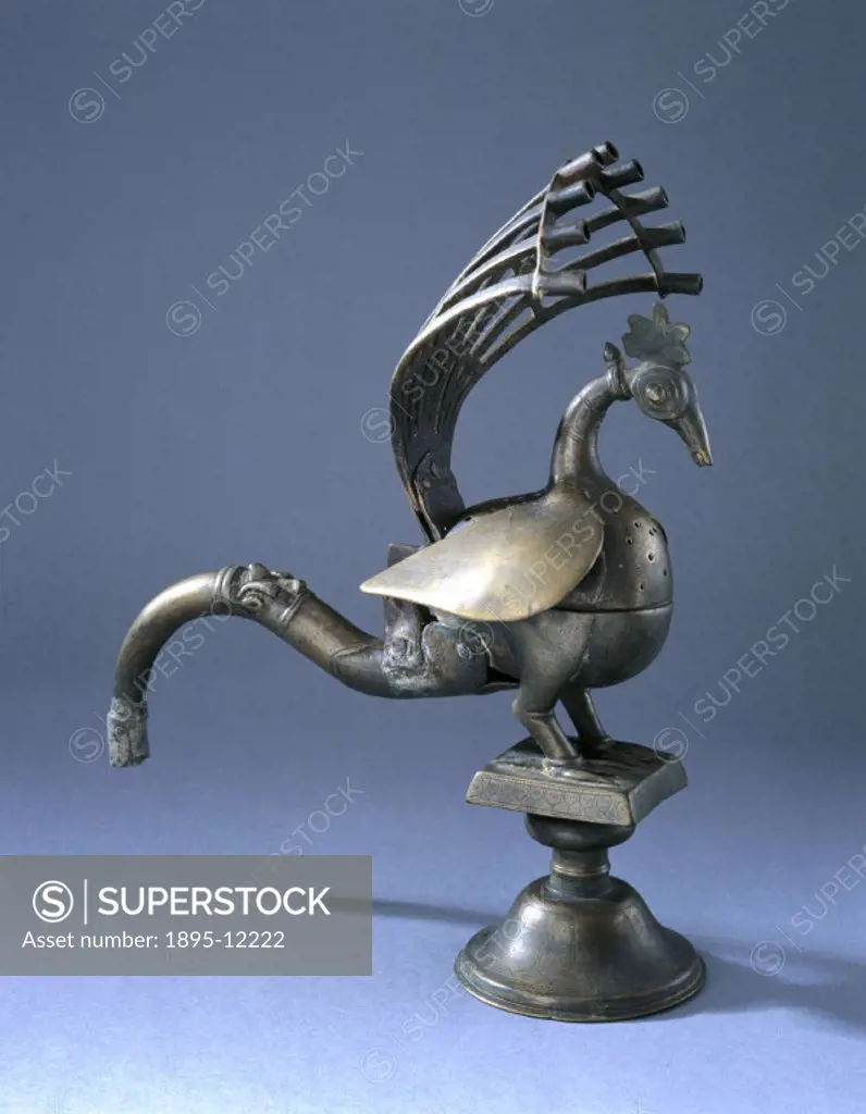 An incense burner, made in the form of a peacock. Brass is an alloy of copper and zinc. Brass which contains a proportion of  less than 36% zinc is du...